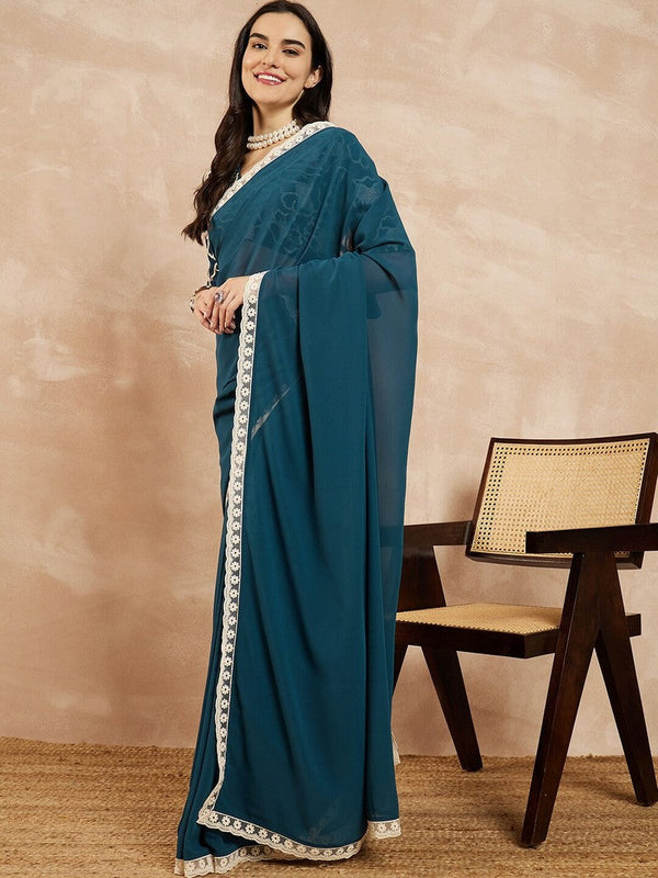 Amazing Teal Color Georgette Fabric Casual Saree
