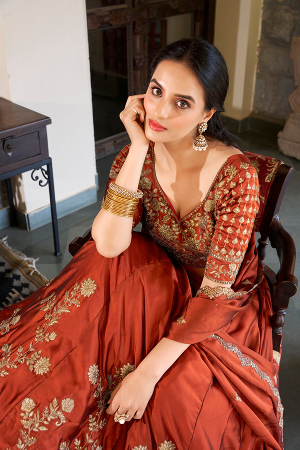 Divine Orange Color Silk Fabric Party Wear Lehenga
