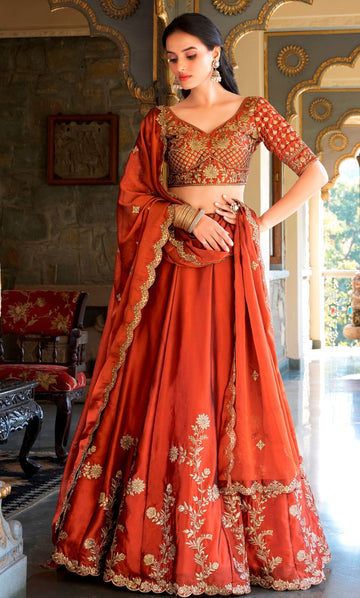 Divine Orange Color Silk Fabric Party Wear Lehenga