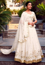 Divine Cream Color Glossy Fabric Party Wear Lehenga