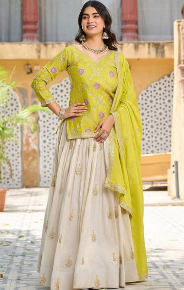 Lovely Cream Color Silk Fabric Party Wear Lehenga