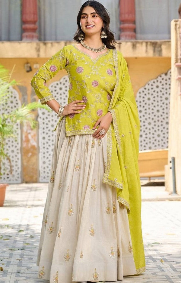 Lovely Cream Color Silk Fabric Party Wear Lehenga