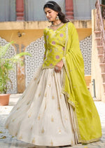 Lovely Cream Color Silk Fabric Party Wear Lehenga