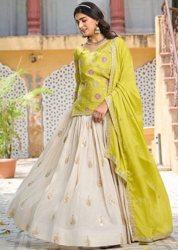 Lovely Cream Color Silk Fabric Party Wear Lehenga