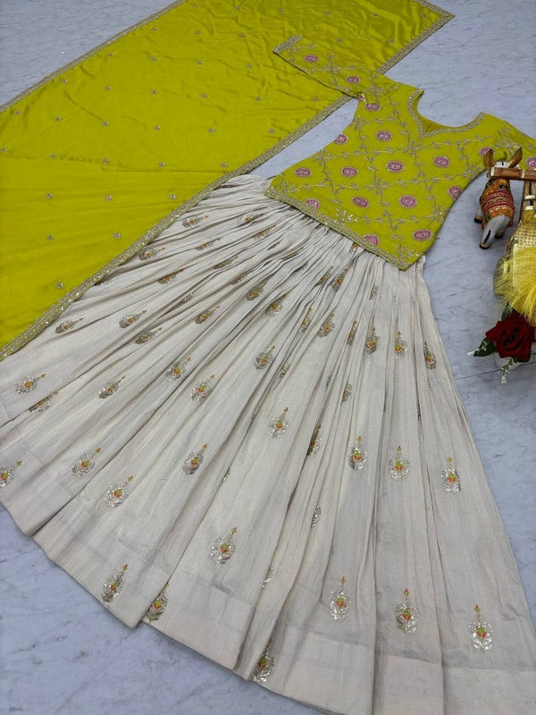Lovely Cream Color Silk Fabric Party Wear Lehenga
