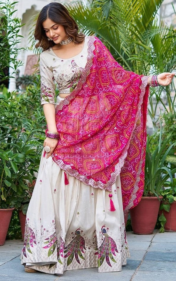 Lovely Cream Color Silk Fabric Party Wear Lehenga