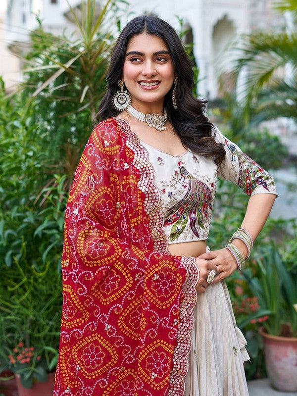Lovely Cream Color Silk Fabric Party Wear Lehenga
