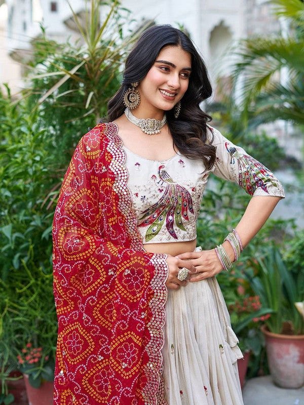 Lovely Cream Color Silk Fabric Party Wear Lehenga