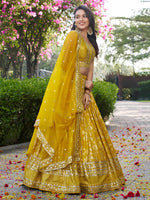Lovely Yellow Color Silk Fabric Party Wear Lehenga