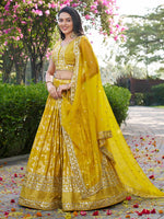 Lovely Yellow Color Silk Fabric Party Wear Lehenga