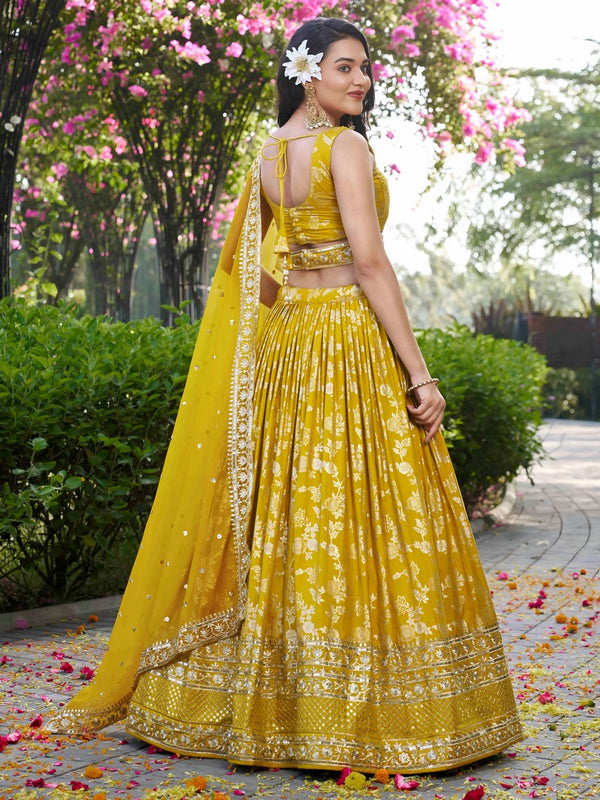 Lovely Yellow Color Silk Fabric Party Wear Lehenga