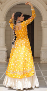 Magnetic Yellow Color Georgette Fabric Designer Kurti With Skirt