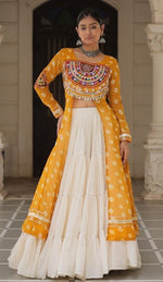 Magnetic Yellow Color Georgette Fabric Designer Kurti With Skirt