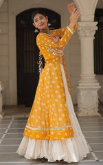 Magnetic Yellow Color Georgette Fabric Designer Kurti With Skirt