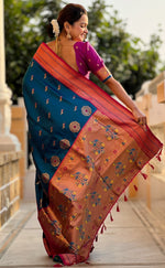 Amazing Turquoise Color Silk Fabric Partywear Saree