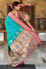Amazing Turquoise Color Silk Fabric Partywear Saree