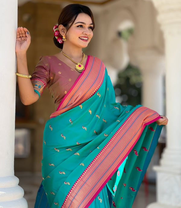 Amazing Turquoise Color Silk Fabric Partywear Saree