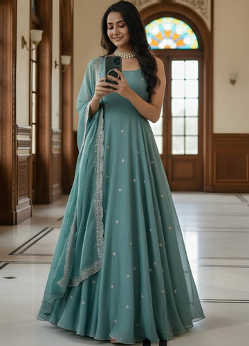Striking Turquoise Color Satin Fabric Gown