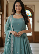 Striking Turquoise Color Satin Fabric Gown