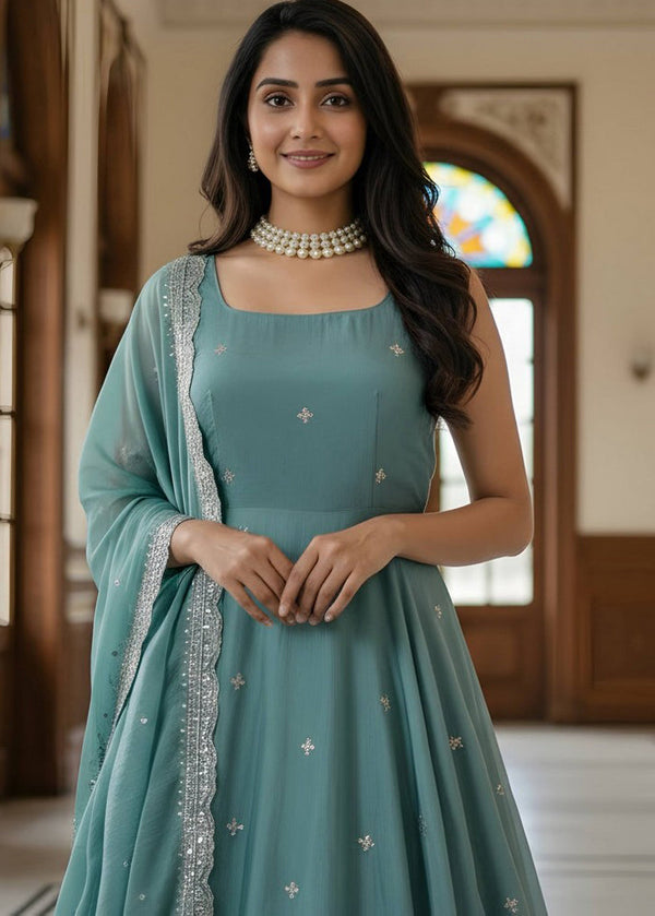 Striking Turquoise Color Satin Fabric Gown