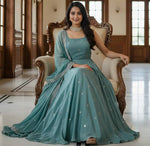 Striking Turquoise Color Satin Fabric Gown