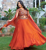 Elegant Orange Color Silk  Fabric Party Wear Lehenga