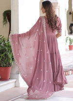 Striking Peach Color Blooming Fabric Gown