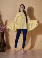 Attractive Yellow Color Cotton Fabric Short Kurti