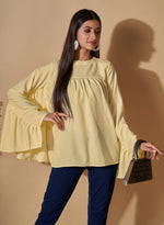 Attractive Yellow Color Cotton Fabric Short Kurti