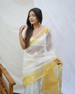 Pleasing Yellow Color Organza Fabric Casual Saree