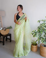 Pleasing Green Color Organza Fabric Casual Saree