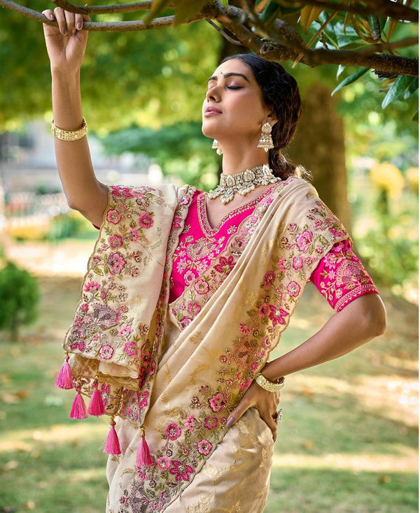 Striking Cream Color Banarasi Fabric Partywear Saree