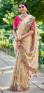 Striking Cream Color Banarasi Fabric Partywear Saree