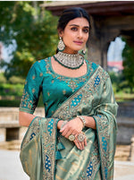 Striking Turquoise Color Banarasi Fabric Partywear Saree
