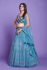 Lovely Turquoise Color Silk Fabric Party Wear Lehenga