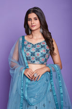 Lovely Turquoise Color Silk Fabric Party Wear Lehenga