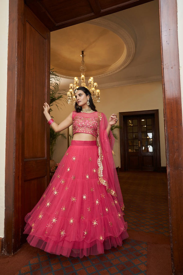 Dazzling Coral Color Net Fabric Party Wear Lehenga
