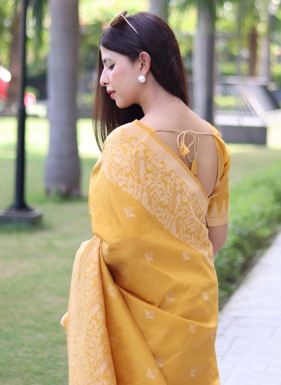 Grand Yellow Color Raw Silk Fabric Casual Saree