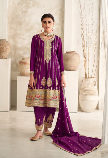 Tasteful Purple Color Silk Fabric Partywear Suit