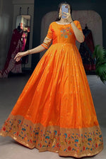 Grand Orange Color Silk Fabric Gown